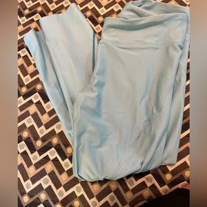 girls under armor athletic pants with design at the bottom